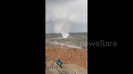 Waterspout spotted swirling near beach on Italy's east coast