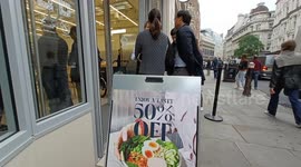 Half hour lunch queues form as delicious half price food attracts large crowds as new Atis opens up at Bank