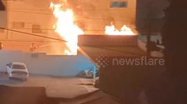 Exclusive footage of a massive fire near SoFi Stadium in Inglewood! Flames engulfed several cars in parking lot complex. Intense moments captured as firefighters rush to the scene, battling the inferno with multiple fire trucks.