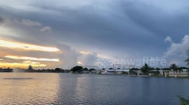 Stormy Sunset Over Lake
