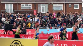 Alice Slater finishes the Great North Run for the British Heart Foundation
