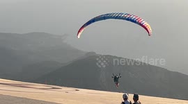 Paragliders fly from 1700 m Babadağ over picturesque Oludeniz in Turkey