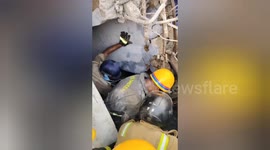 Rescue teams search rubble of collapsed building in India