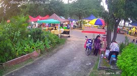 Food vendor plunges into drain when concrete cover breaks