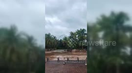 China: Ferries wheel in Haikou spinning in the strong winds of Super Typhoon Yagi
