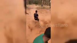 Algeria: Children's enjoying the rain after a heavy storm hit Ghardaia, Algeria