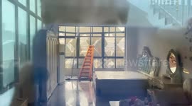 Apartment windows collapse during typhoon in China