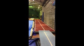 Little girl practices gymnastics backflips before competition and experiences a small tumble