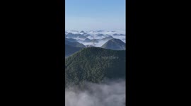 Breathtaking sea of clouds over mountains in SW China's Yunnan