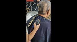 Toddler gives father a haircut with hilarious results
