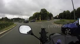 Right of way violation in a roundabout. Paris suburb, France, Yvelines department, Saint-Nom-la-Breteche  9 sept 2024