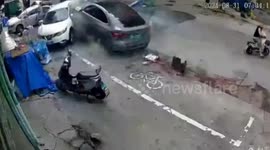 Out-of-control electric car suddenly speeds up and crashes into vehicles