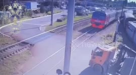 Russia: Truck Packed With Scrap Metal Torn In Two By Commuter Train In St Petersburg