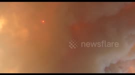 Sky dominated by smoky orange haze as Airport Fire continues to burn in California