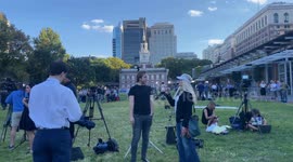 Activists and reporters convene near Constitution Center before debates