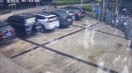 Metal sheet lands on hospital worker's head during typhoon in China