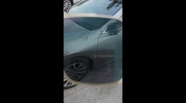 Man uses polarized lens to check paint protection film in northeastern China