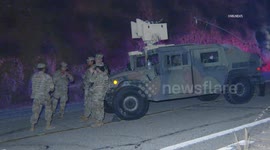 USA: San Gabriel Mountains National Guard at Mt Baldy and Bear Escaping the Bridge Fire