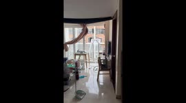 Condo windows ripped out by typhoon in Vietnam