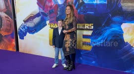 Michelle Bridges and son attend the Australian Premiere of Transformers One red carpet
