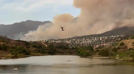 Video shows Airport Fire burning in distance from Dove Canyon, California