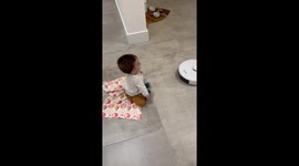 One Vacuums While the Other Wipes