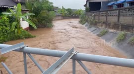 Rivers burst their banks flooding streets in Chiang Mai, Thailand