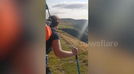 Couple and pampered pooch enjoying England's longest dog walk