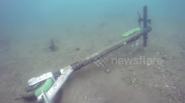 Dozens of Electric Scooters Recovered by Divers from the Seabed in Greece as People Keep Tossing Them into the Water