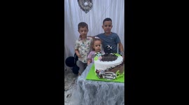 Unexpected fall during birthday party photo creates a hilarious moment to remember