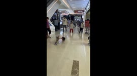 Boys have break dancing battle in shopping mall in China