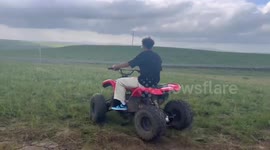 Youngster topples over in amusing quad bike fail
