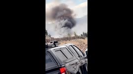 Car Fire Spreads to Surrounding Area