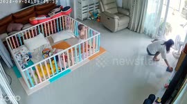 Mother shocked when baby climbs out of playpen