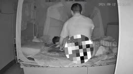 Sleeping family awoken in terror as water bucket crashes through ceiling onto their bed