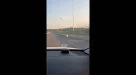 Man drives toy car on highway in Henan Province, China