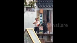 Heroic locals armed with umbrella and ladle stop knife-wielding attacker in eastern China