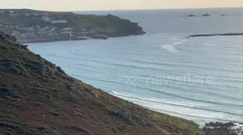 Drugs boat used by smuggling gang washed up on beach at Sennen in Cornwall