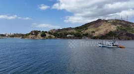 A Brazilian fishing boat goes out to sea in search of its livelihood