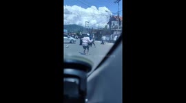 Student brawls in Indonesia were caught on video from inside the car