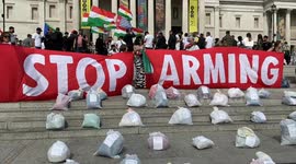 Pro-Palestine activists in Trafalgar Square display bags with “body parts” of Palestinian children and adults killed by Israeli forces