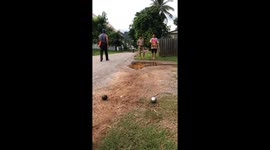Person hit by motorcycle while walking in Batam, Indonesia