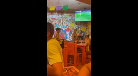 Prank with dummy drinks leaves man tumbling from his chair in a café