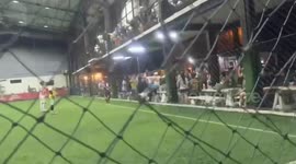 Football fans fight during game in Thailand