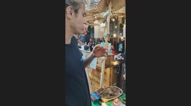 Man eats live Ulat Sagu (maggot) in Borneo Malaysia