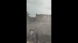 Ten relatives killed when building collapses in India
