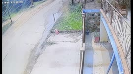 Van Swerves Into Closed Garage