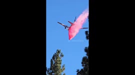 Plane Drops Fire Retardant On Davis Creek Fire