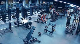 Gymgoer calls for help by flicking his shoe when weights trap him
