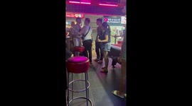 Young Aussie tourists tussle outside bar in Phuket, Thailand